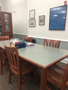 a work table for six on the east side of the library's second floor.