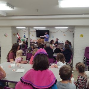 Library staff members announce prize winners at the 2023 Summer Reading Wrap-Up Party